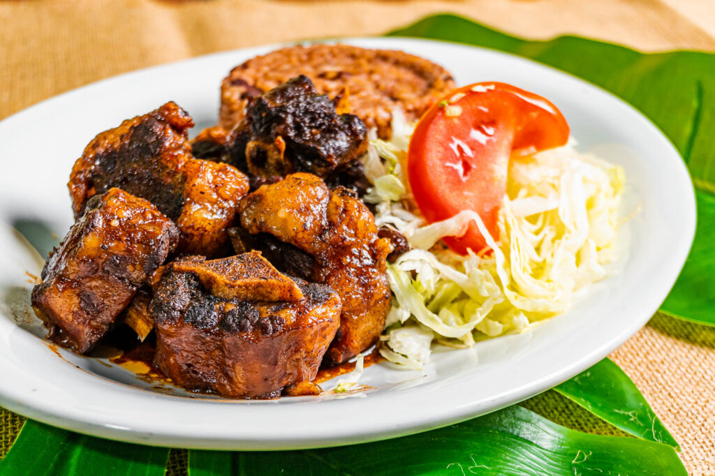 Slow-cooked Jamaican oxtails with rice and peas at Island Grill & Pub, Rock Hill SC